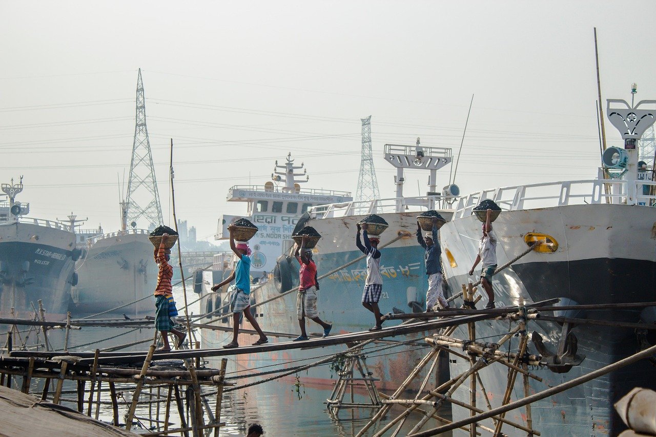 workers, people, boats, ships, pier, port, coal workers, shipping, shipping port, crossing bridge, wooden plank, workers, workers, workers, workers, workers, port
