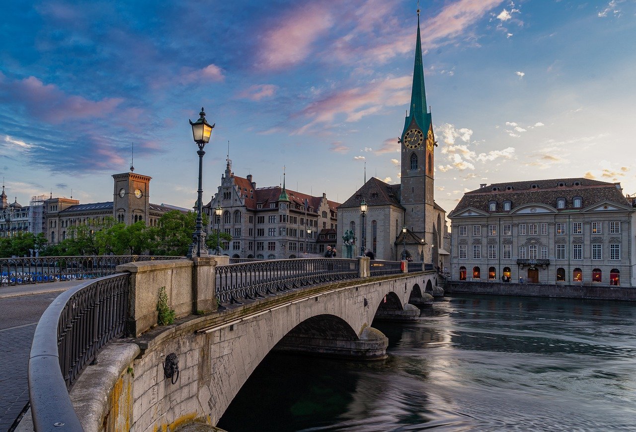 bridge, city, river, zurich, switzerland, architecture, building, historic center, houses, sky, nature, church, travel, fraumünster, münster bridge, twilight, church clock, monument, street lamps, limmat